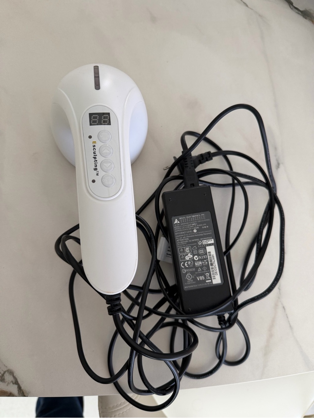 White Handheld Electronic Massager with Power Adapter